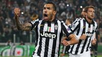 Carlos Tevez selebrasi gol kedua Juventus lawan Real Madrid (Reuters / Stefano Rellandini)