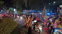 Suasana malam takbiran yang diikuti ribuan warga Manado, Jumat (21/4/2023) malam. (Foto: Yoseph Ikanubun/Liputan6.com)