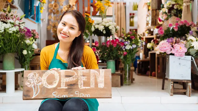 perempuan penjual bunga