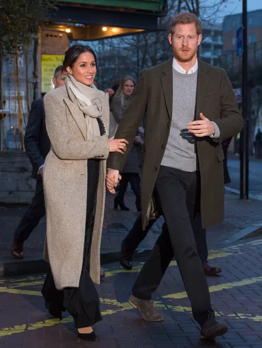 Rumah baru Meghan Markle dan Pangeran Harry miliki 7 pintu masuk dan keluar yang bisa menghindari mereka dari kamera paparazzi. (DOMINIC LIPINSKI  POOL  AFP)