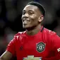 Striker Manchester United, Anthony Martial berselebrasi usai mencetak gol ke gawang Norwich City pada pertandingan lanjutan Liga Inggris di Old Trafford (11/1/2020). MU menang telak 4-0 atas Norwich. (Martin Rickett/PA via AP)