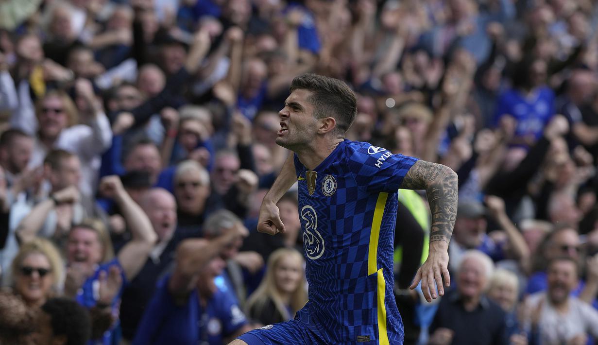 <p>Gelandang Chelsea, Christian Pulisic melakukan selebrasi usai mencetak satu-satunya gol pada menit 90 ke gawang West Ham United pada pertandingan lanjutan Liga Inggris di Stamford Bridge di London, Minggu (24/4/2022). Chelsea memenangkan pertandingan atas West Ham 1-0. (AP Photo/Alastair Grant)</p>