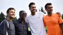 Palolo Maldini berfoto bersama, Tomasz Bednarek (kiri), Clarence Seedor (2kiri), dan David Pel usai laga ganda putra ATP Challenger Tour di Aspria Tennis Club, Milan, (27/6/2017). Maldini kalah 1-6, 1-6. (AFP/ Marco Bertorello)