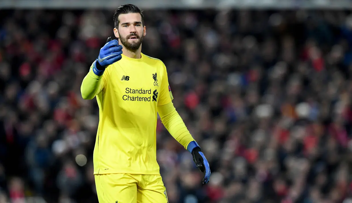 4. Alisson Becker (Liverpool) - Overall 87 (Naik 2 Poin). (AFP/Paul Ellis)