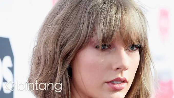 Taylor Swift Resmi Bertunangan dengan Calvin Harris?