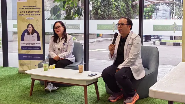 dr Grace Tumbelaka dan dr. Antonius Andi Kurniawan