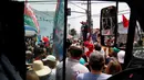 Mantan presiden Brasil (2003-2010) dan calon presiden dari Partai Buruh (PT) berhaluan kiri, Luiz Inacio Lula da Silva menyampaikan pidato saat kampanye di Sao Mateus, Negara Bagian Sao Paulo, Brasil, pada 17 Oktober 2022. - Lula da Silva dan presiden Jair Bolsonaro akan menghadapi putaran kedua pemilihan presiden pada 30 Oktober, dengan ekspektasi persaingan ketat mendorong kedua belah pihak untuk mengintensifkan kampanye menjelang pemilihan. (Foto oleh Miguel SCHINCARIOL / AFP)