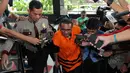 Pengusaha Ichsan Suaidi KPK saat akan menjalani pemeriksaan Perdana di gedung KPK, Jakarta, (26/2). Ia menerima suap sebesar Rp400 Juta melalui pengacara Awan Lazuardi Embat guna menunda pengiriman salinan putusan kasasi. (Liputan6.com/Helmi Afandi)