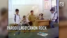 Seorang guru dan beberapa murid bergaya ala band rock papan atas dengan memainkan lagu Canon Rock - Jerry C. Yuk intip aksinya!