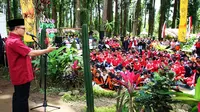 Pemkab Banyuwangi, Jawa Timur, menggelar Kemah Kebangsaan yang berlangsung di Wana Wisata Sumbermanis, Gombengsari, Kecamatan Kalipuro. (Liputan6.com/Dian Kurniawan)