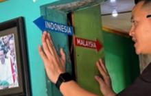 Unik! Rumah Ini Berdiri di Perbatasan Indonesia–Malaysia, Cuma Butuh Satu Langkah