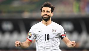 Mohamed Salah berhasil menjadi penentu kemenangan Mesir saat menumbangkan Pantai Gading di babak 16 besar Piala Afrika 2021 yang berlangsung di Stade Omnisport de Douala, Rabu (26/1/2022) malam WIB. (AFP/Charly Triballeau)