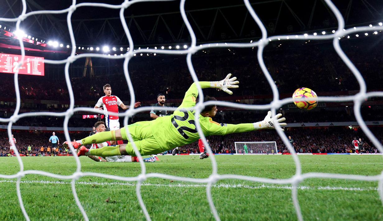 Mohamed Salah menjadi penyelamat The Reds dengan menyetak gol penyeimbang dan mengamankan satu poin di kandang lawan. (AFP/Adrian Dennis)