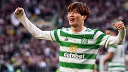 Kyogo Furuhashi. Sayap Jepang berusia 27 tahun yang direkrut Glasgow Celtic dari Vissel Kobe di awal musim 2021/2022 ini mencetak hattrick di pekan ke-2 Liga Skotlandia saat mengalahkan tamunya Dundee FC 6-0 (8/8/2021). Total ia telah mencetak 16 gol dan 5 assist dari 26 laga. (AFP/Andy Buchanan)