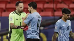 Pada laga yang digelar di Estadio Nacional de Brasilia tersebut Luis Suarez dan kawan-kawan menyerah dalam adu penalti dengan skor 4-2. (Foto:AP/Bruna Prado)
