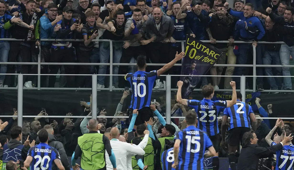 <p>Lautaro Martinez membuat Inter unggul 1-0 sekaligus menjauhkan agregat jadi 3-0 pada menit ke-74. Hingga laga berakhir, skor 1-0 bertahan dan Inter lolos ke final Liga Champions. (AP Photo/Antonio Calanni)</p>