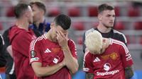 Ekspresi para pemain Manchester United di akhir laga final Liga Europa melawan Tottenham di San Mames, Bilbao, Spanyol, Rabu, 21 Mei 2025. (AP Photo/Bernat Armangue)