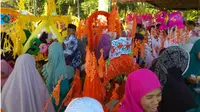 Maulid Nabi, ratusan warga Banjar di Sumut melaksanakan Ngayun Massal. (Liputan6.com/Reza Efendi)