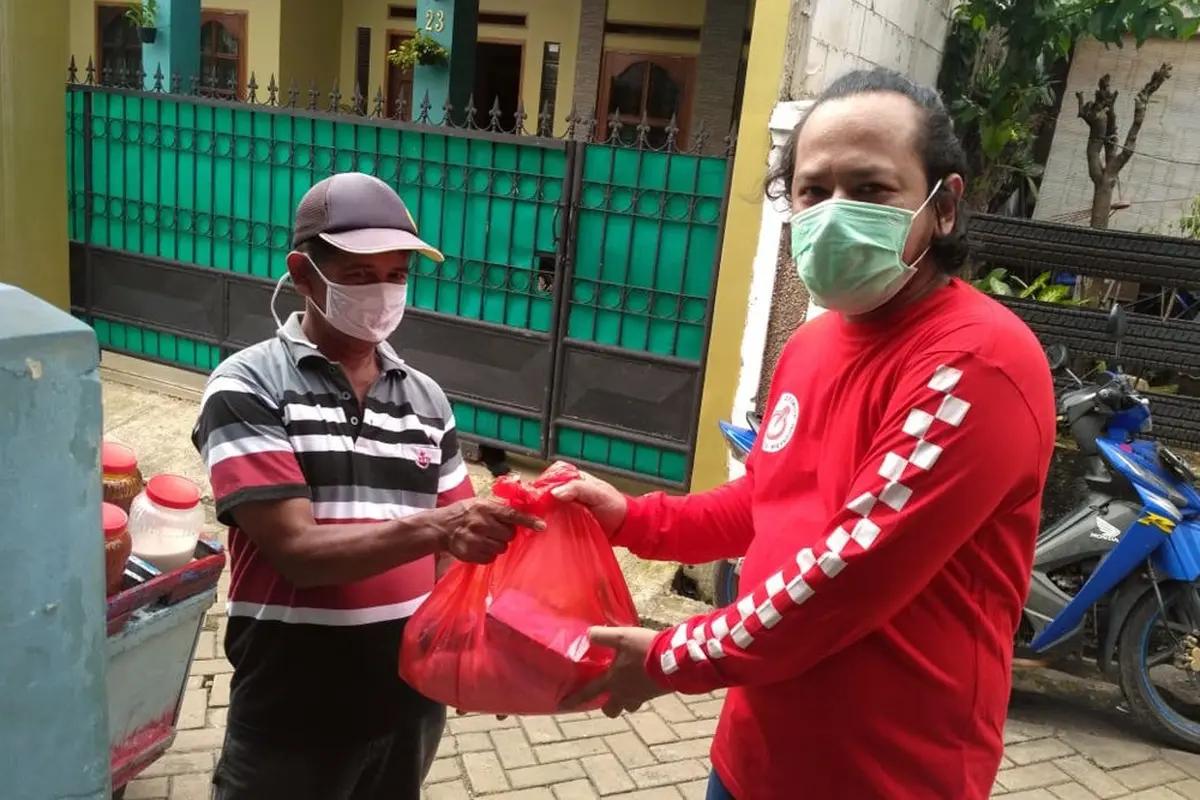 Forwot dan Bikers Tangsel Bagi-Bagi Sembako Untuk Masyarakat (Ist)