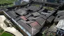 Foto hasil bidikan dari udara pada 19 Juli 2020 menunjukkan pemandangan Aijing Zhuang, desa bersejarah yang dikelilingi benteng, di Tongan, Wilayah Yongtai, Provinsi Fujian, China. Beragam kebijakan telah diterapkan guna melestarikan desa-desa bersejarah di Wilayah Yongtai. (Xinhua/Wei Peiquan)