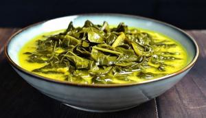 Daun Singkong Bumbu Kuning (created by AI)