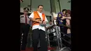 Usai diperiksa KPK,  Mantan hakim Pengadilan Tipikor Bandung, Ramlan Comel diam seribu bahasa, Selasa (19/8/14) (Liputan6.com/Herman Zakharia)