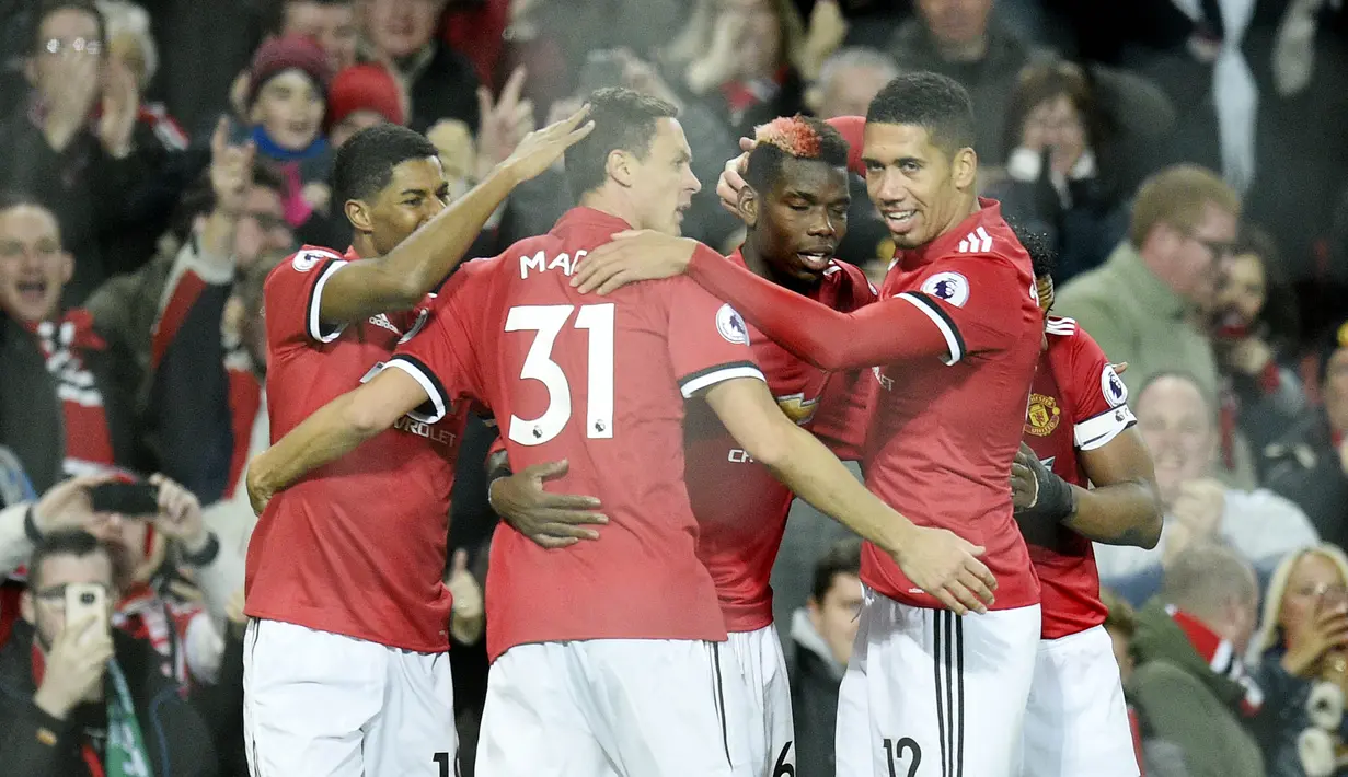 4. Manchester United - Mengeluarkan 5,2 juta poundsterling per pekan. (AFP/Oli Scarff)