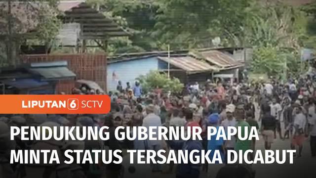 Polisi menangkap 14 orang peserta aksi mendukung Gubernur Papua Lukas Enembe yang jadi tersangka korupsi. Mereka yang ditangkap kedapatan membawa senjata tajam hingga bom rakitan.