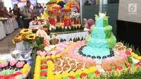 Hasil karya peserta lomba kreasi jajanan pasar di Jakarta, Rabu (20/2). Sebanyak 43 peserta mengikuti lomba yang digelar dalam rangka Musyawarah Nasional (Munas) 2019 Asosiasi Perusahaan Jasaboga Indonesia (APJI). (Liputan6.com/Angga Yuniar)