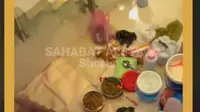 Viral Emak-Emak Piknik di Mal, Bawa Tikar,Termos Nasi dan Lauk Lengkap. foto: TikTok @sahabatalstroshorts