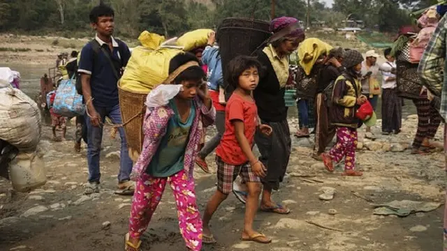 Pengungsi yang menyelamatkan diri dari Negara Bagian Kachin, Myanmar (Zau Ring Hpara / AFP PHOTO via The Guardian)