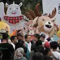 Maskot Asian Games 2018, Kaka badak bercula satu, Atung rusa bawean, dan Bhin Bhin burung cendrawasih saat menyapa warga di Car Free Day, MH Thamrin, Jakarta, Minggu (25/3). (Merdeka.com/Iqbal S. Nugroho)