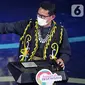 Menteri Pariwisata dan Eknomi Kreatif Sandiaga Uno memberi sambutan pada ADWI 2021 di Jakarta, Selasa malam (7/12/2021). Ada tujuh kategori penilaian yang ditetapkan, yaitu&nbsp;homestay, toilet, suvenir, desa digital, CHSE, konten kreatif, serta daya tarik wisata. (Liputan6.com/Fery Pradolo)