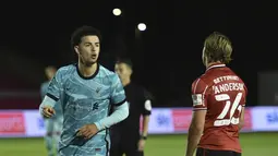 Pemain Liverpool, Curtis Jones berselebrasi setelah mencetak gol ke gawang Lincoln City pada putaran ketiga Piala Liga Inggris di stadion LNER, Lincoln, Inggris, Kamis (24/9/2020). Liverpool menang telak 7-2 atas  Lincoln City. (Peter Powell, Pool via AP)