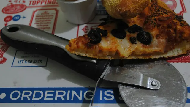 Ilustrasi Domino Pizza (Foto: Jose Castillo/Unsplash)
