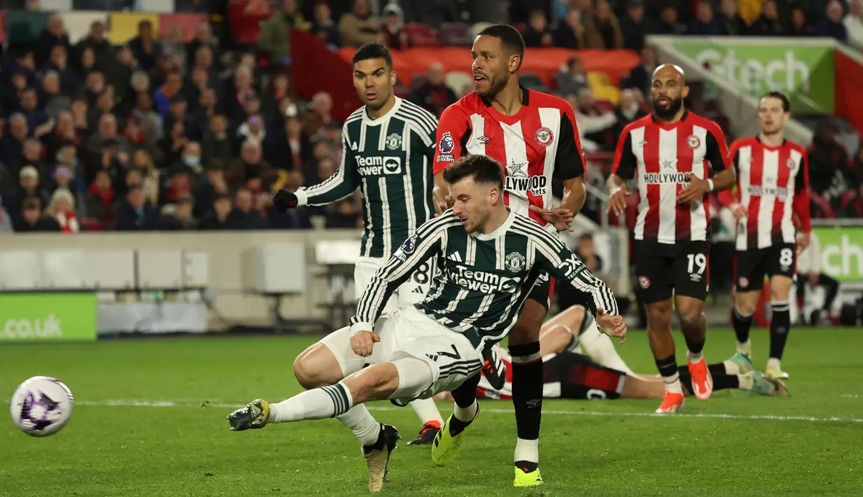 Tiga menit berselang, Brentford berhasil menyamakan kedudukan lewat gol Kristoff Ajer di menit ke-90+9. (AP Photo/Ian Walton)