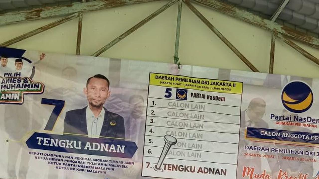 Caleg NasDem Dilaporkan ke Bawaslu Gara-Gara Spanduk Depan Lokasi Pencoblosan di Malaysia