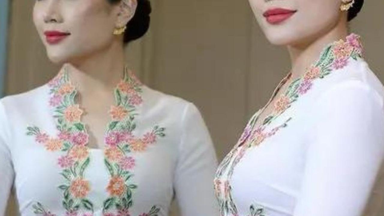 Penampilan Angela semakin lengkap dengan riasan wajah yang glamor