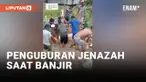 Duh, Lagi Banjir Tapi Tetap Nguburin Jenazah