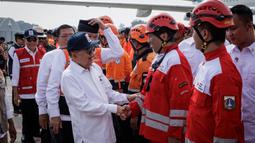 Adapun total personel yang berangkat dalam tim kemanusiaan ke Myanmar berjumlah 157 orang. Sebanyak 92 orang di antaranya telah berada di Myanmar untuk melakukan sejumlah misi kemanusiaan. (YASUYOSHI CHIBA/AFP)