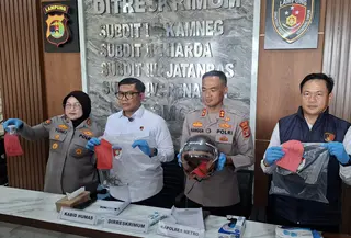 Polisi ungkap kasus penembakan ASN di Metro, Lampung. (Liputan6.com/Ardi Munthe).