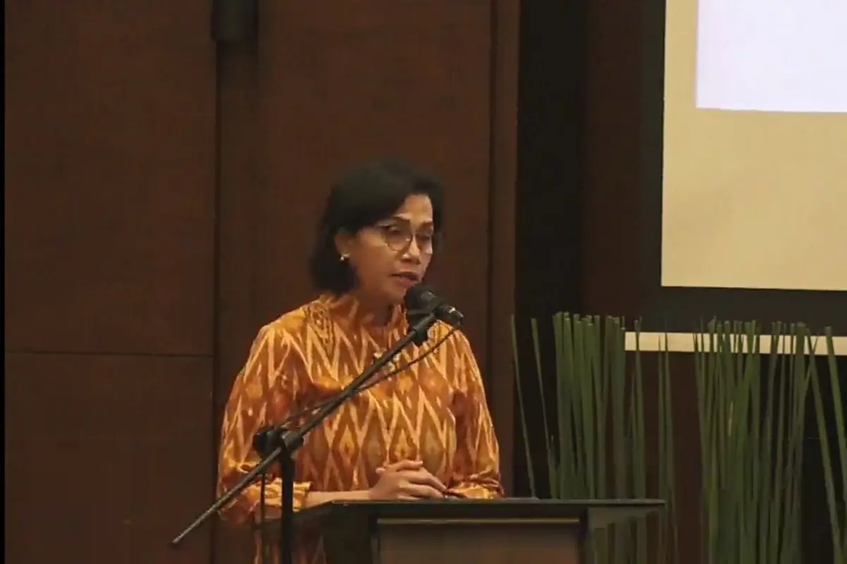 Menteri Keuangan Sri Mulyani Indrawati dalam acara kerja sama Kementerian Keuangan dan Kejaksaan Agung untuk meningkatkan pengawasan keuangan negara. (Arief/Liputan6.com)