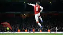 Pemain Arsenal Aaron Ramsey merayakan gol ketiga untuk timnya saat melawan CSKA Moscow pada pertandingan Liga Eropa di stadion Emirates, London (5/4). (AP Photo / Tim Ireland)