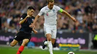 Harry Kane mengantarkan Inggris meraih kemenangan atas Kroasia dengan skor 2-1. (AFP/Ben Stansall)
