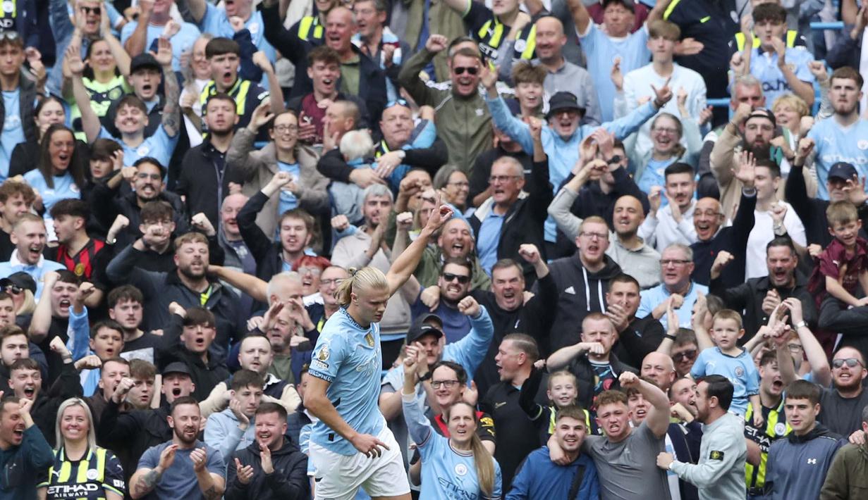 Manchester City meraih kemenangan pada pekan ke-4 Premier League 2024/2025, Sabtu (14/9/2024) malam WIB. Menjamu Brentford, The Citizens menang dengan skor 2-1. (AP Photo/Scott Heppel)