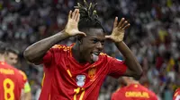 Selebrasi gelandang Timnas Spanyol, Nico Williams setelah mencetak gol pertama timnya ke gawang Timnas Inggris pada laga final Euro 2024 di Olympiastadion, Berlin, Jerman, Minggu (14/7/2024). (AP Photo/Matthias Schrader)