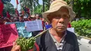Serikat Tani Indramayu menggelar aksi di depan Gedung Kementerian Pertanian (Kementan) di jalan R.M Harsono, Ragunan, Jakarta, Rabu (24/9/2025). (merdeka.com/Arie Basuki)
