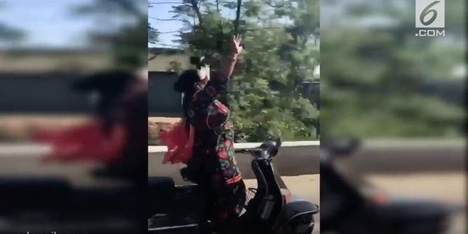 VIDEO: Aksi Emak-Emak Joget Sambil Mengendarai Motor