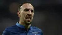 4. Franck Ribery, tampil superior saat bersama Bayern Munchen dengan meraih banyak gelar, namun performanya menurun bersama timnas Prancis. Hal ini membuat publik Prancis kecewa karena menganggap gelandang itu tidak tampil total. (AFP/Franck Fife) 