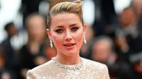 Penampilan Amber Heard di karpet merah Cannes Film Festival 2019. (Alberto PIZZOLI / AFP)